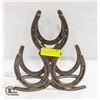 Image 1 : CAST IRON HORSE-SHOE DESIGN BOTTLE HOLDER