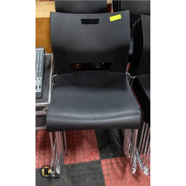 STACK OF 8 STACKING CHAIRS