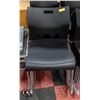 Image 1 : STACK OF 8 STACKING CHAIRS