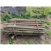 Image 1 : Approx. 50- 5 ft sharpened, treated posts, 2 1/2 to 3 inch