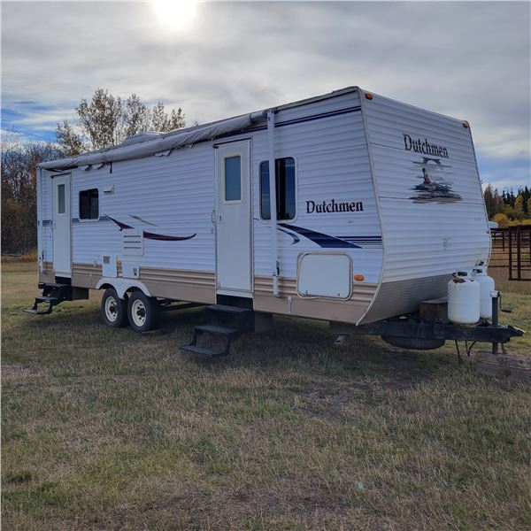 2007 Dutchmen Holiday Trailer, tandem axle, 26 ft c/w 1 slideout, sleeps 6, has keys, awning is poor