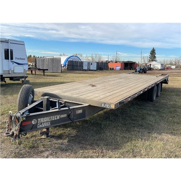 2015 Trailtech Tandem Axle Dually 26ft deck, 4ft beaver tails, c/w flip down ramps, new spare tire, 