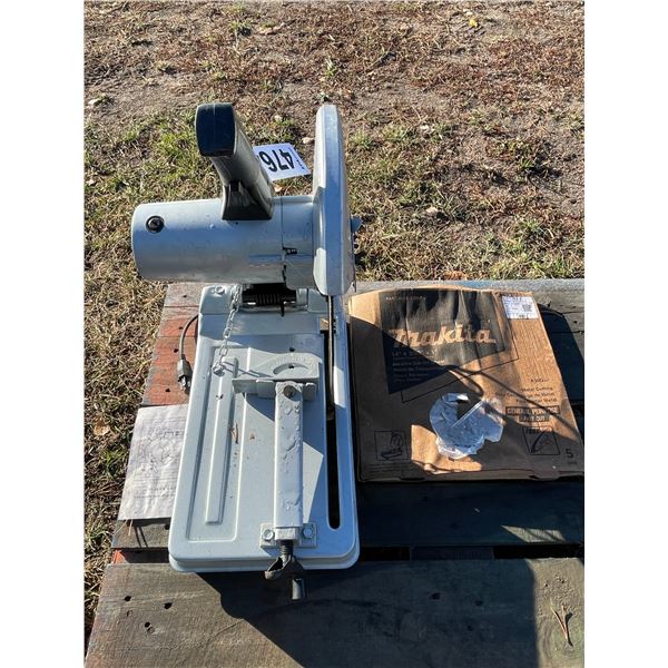 As New electric cut off & approx. 5 14in new blades, works