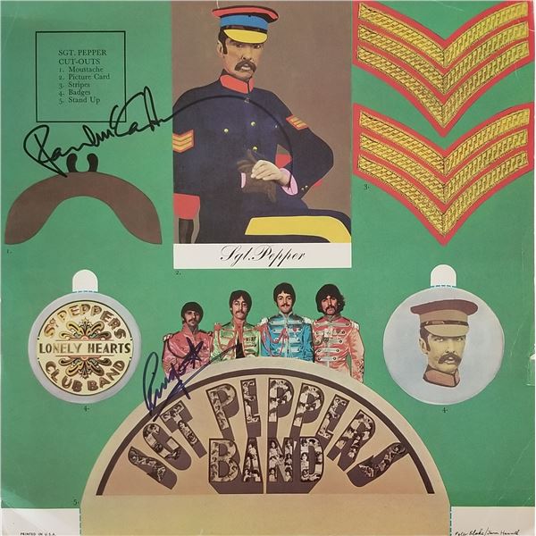 The Beatles Sgt. Pepper Lonely Hearts Club Band autographed album insert. GFA Authenticated