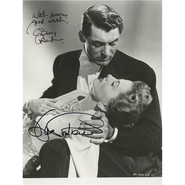 Cary Grant and Joan Fontaine signed photo. GFA Authenticated