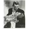 Image 1 : Cary Grant and Joan Fontaine signed photo. GFA Authenticated