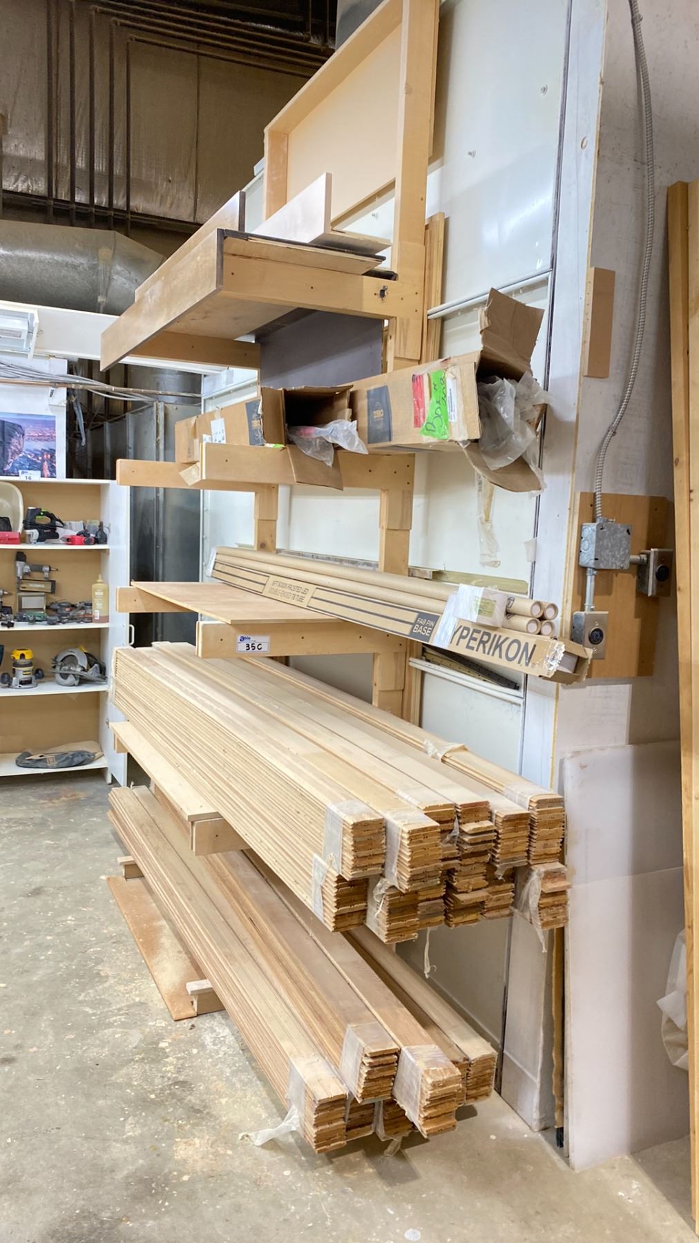 WOODEN CANTILEVER STORAGE RACK AND CONTENTS - 20 BUNDLES OF 12 TONGUE ...