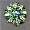 Image 4 : Emerald green rhinestone brooch, w/ gold cuff bracelet