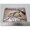 Image 1 : Sealed "Remington" tin sign - approx. 8"x10"