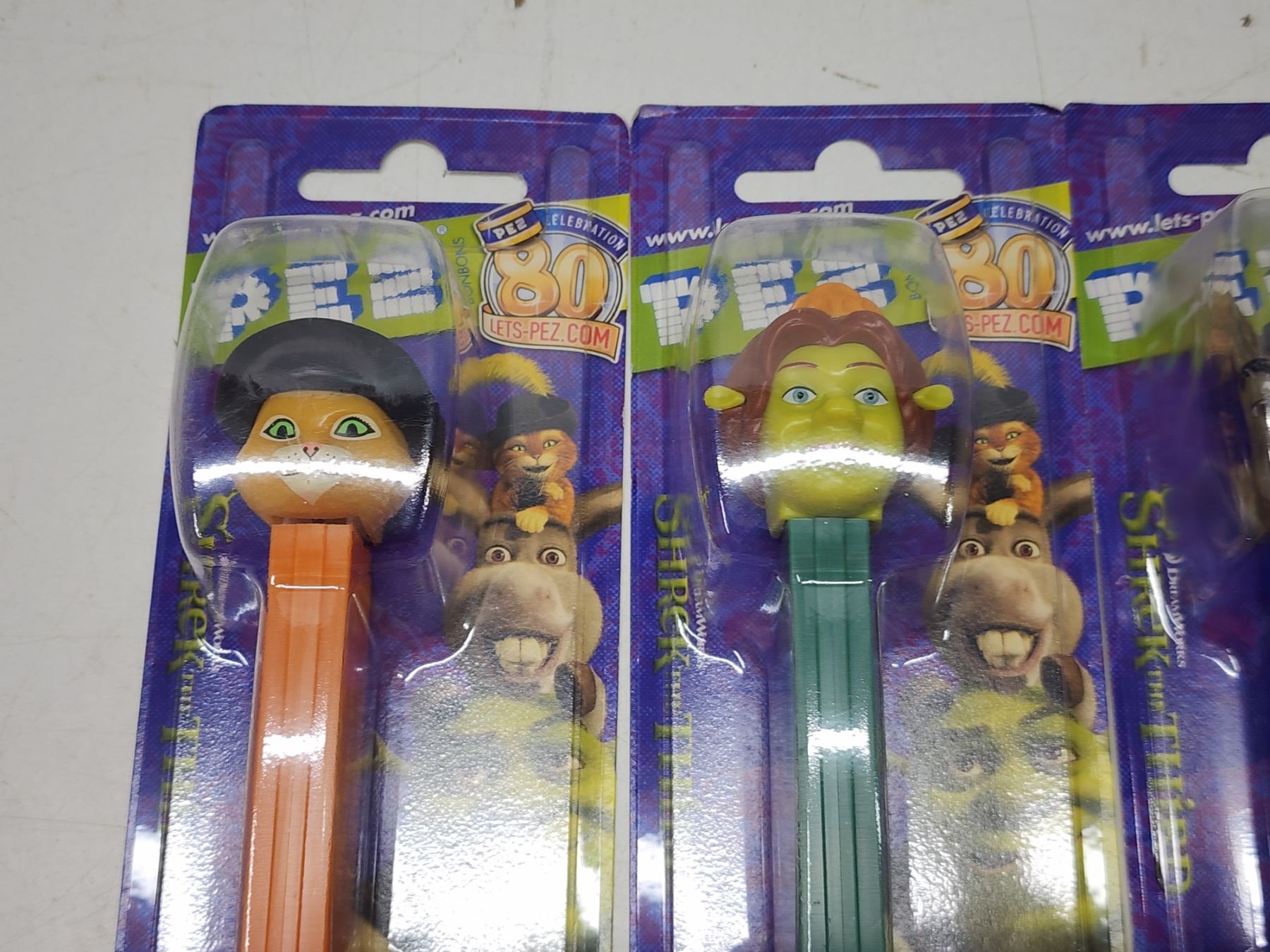 4 Shrek Pez dispensers & Trick dice Schmalz Auctions