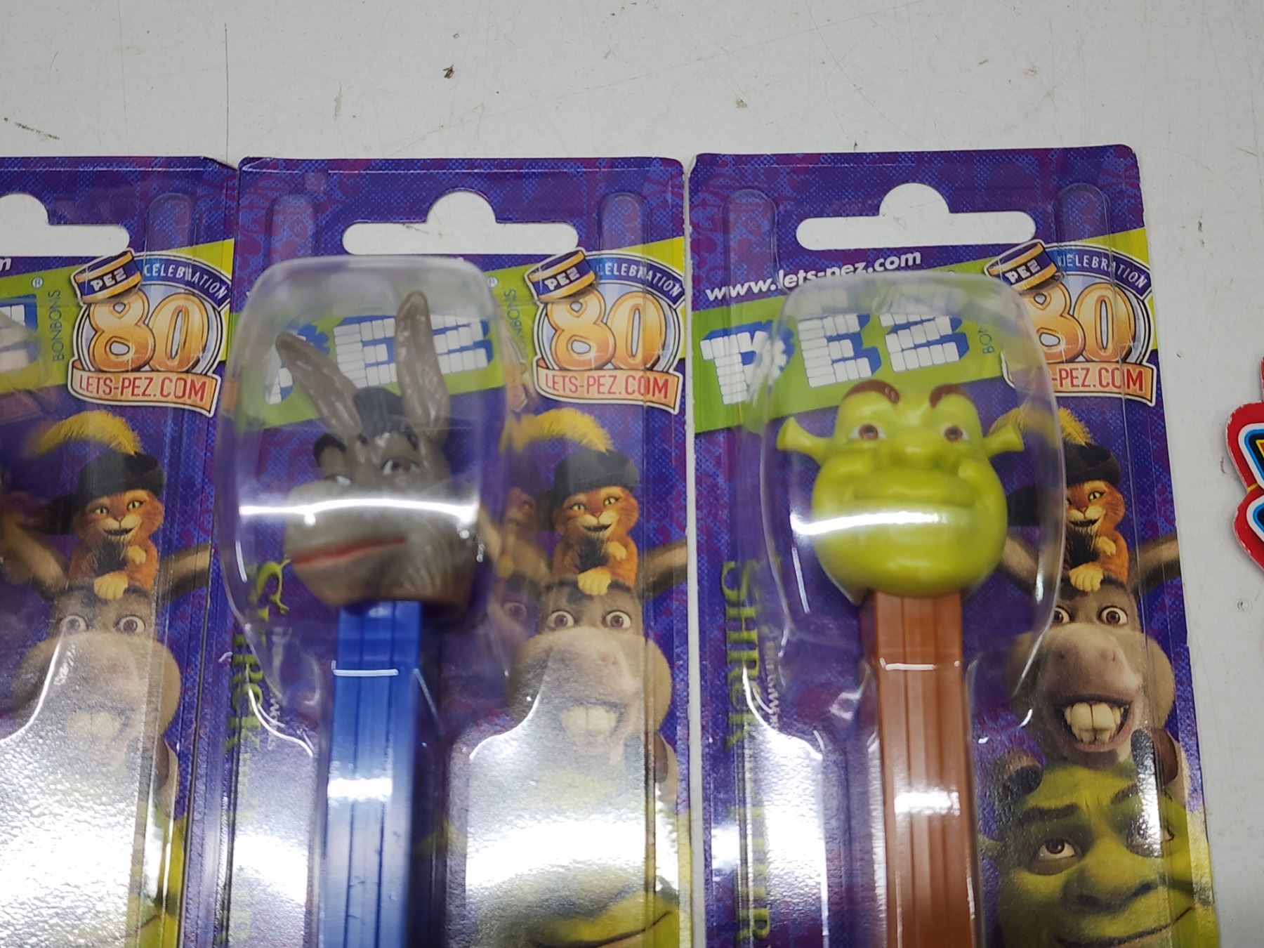 4 Shrek Pez dispensers & Trick dice Schmalz Auctions