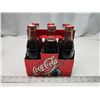 Image 1 : 6 pack of glass Coca-Cola - full, in cardboard