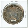 Image 2 : 1953 No Shoulder Fold Canadian Silver Dollar with Diving Canoe. There is a major Die Rotation on thi