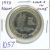Image 1 : 1973 Regina Trade Dollar. Long E in HOME. BU.