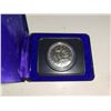 1075  1976 Specimen Nickel Dollar. Voyageur Dollar. Housed in its original Royal Canadian Mint blue clamsh