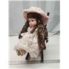 Image 1 : Collector's porcelain doll, w/ rocking chair