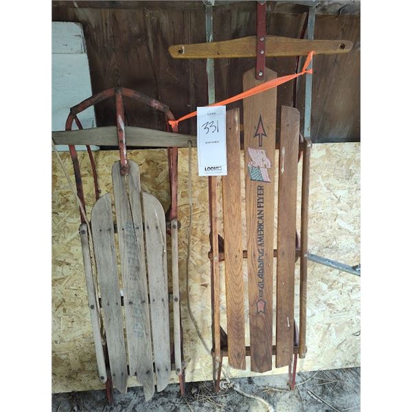 Set of 2 antique wood sleds