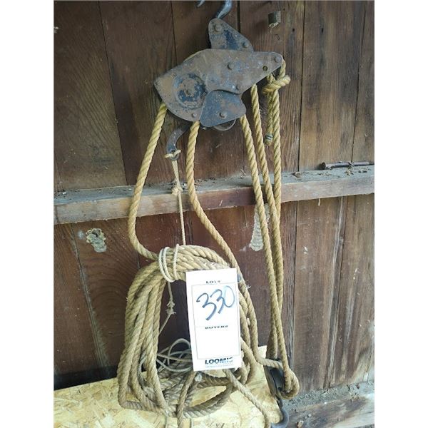Antique rope block and tackle pulley system
