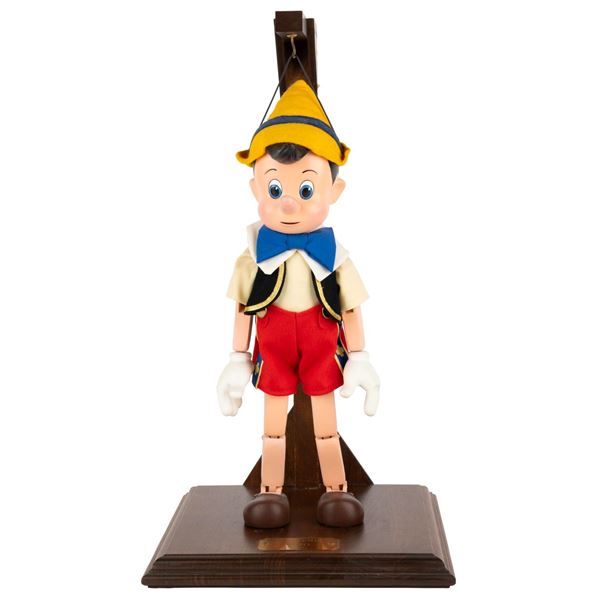 A WED "Pinocchio" Puppet with Stand.