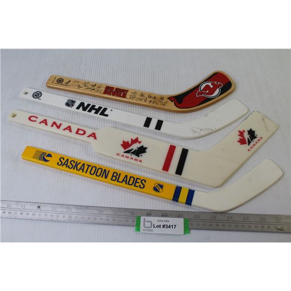 (4) Small Souvenir Hockey Sticks - Canada - NHL - Saskatoon Blades - New Jersey Devils