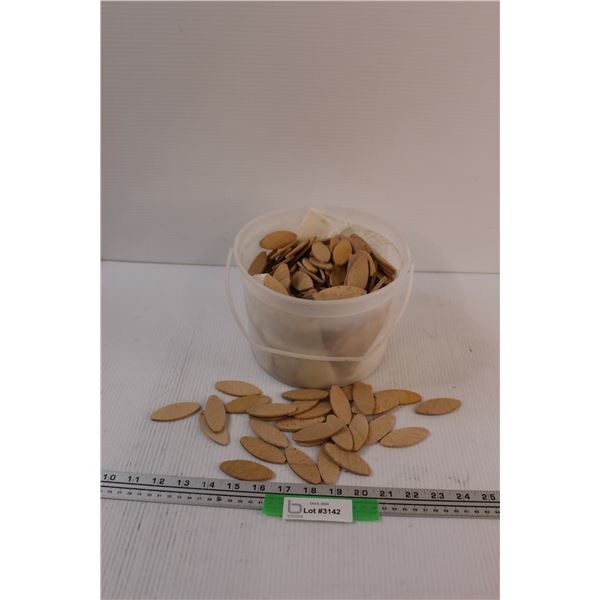 Bucket full of Dado Wood Discs - 2.5" Long