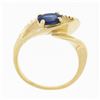 Image 7 : 14k Gold 0.80 ctw Oval Sapphire Solitaire Polished Grooved Open Loop Bypass Ring