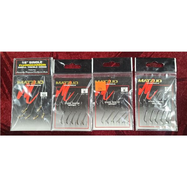 THREE PACKS OF MATZUO AMERICA SIZE 6  QTY 10 PLAIN SHANK OFFSET HOOKS AND ONE PACK OF 18" SINGLE FLU