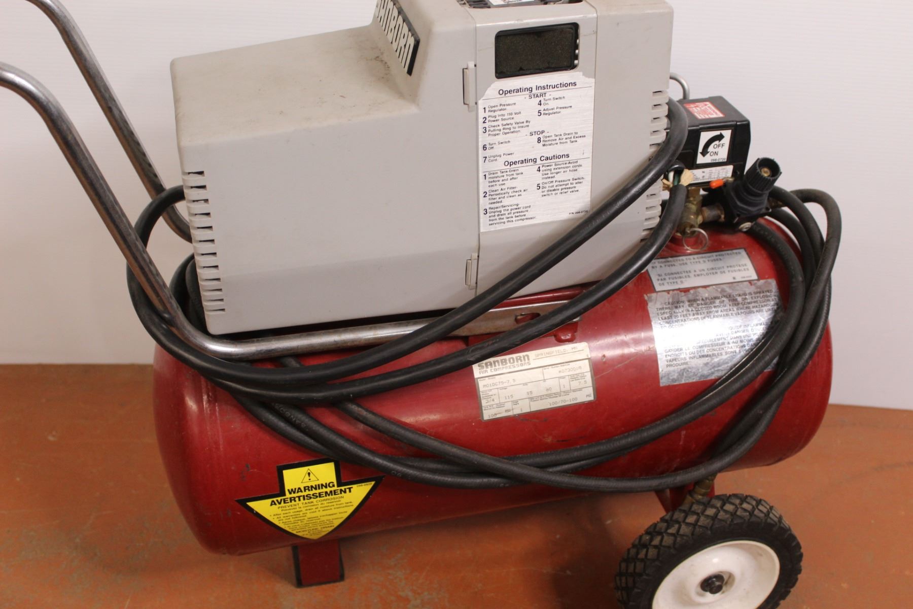 * Sanborn 3/4hp Wheeled Air Compressor - Gallon Tank - Powers On, as is