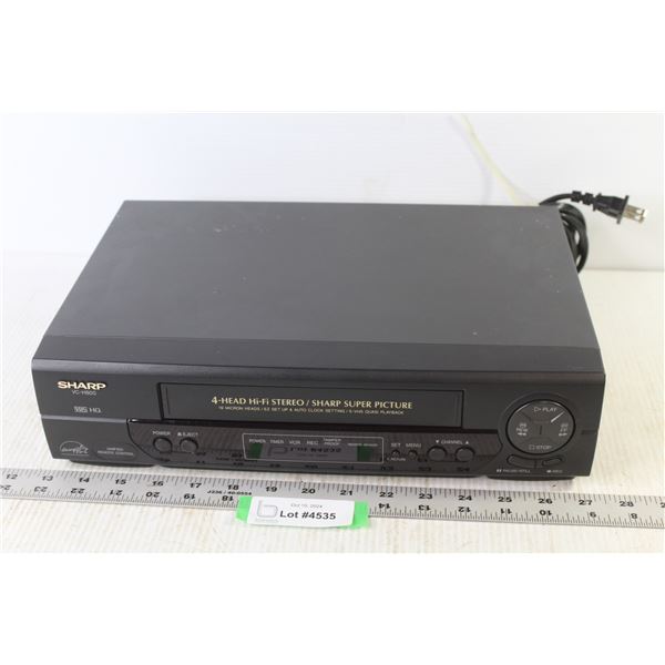 Sharp 4 Head VHS Recorder (powers on)