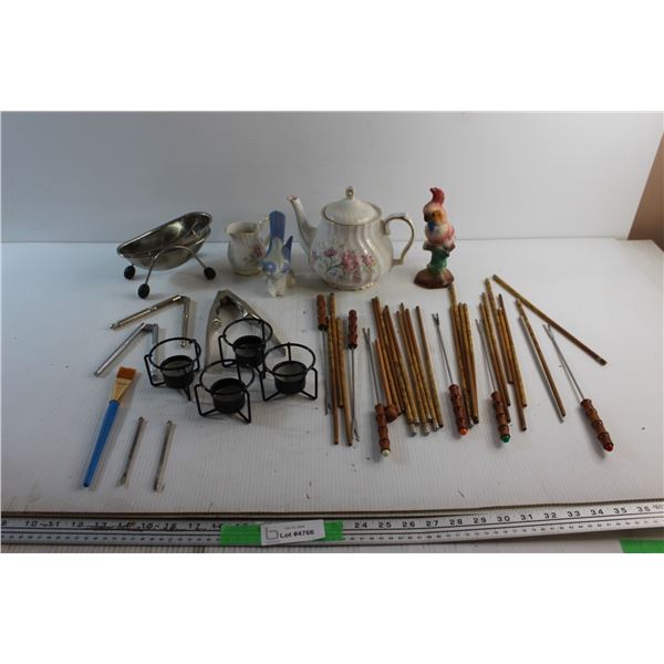 Fondue Sticks, Candle Holders, Tea Pot, Creamer, Nutcrackers and Assorted Items
