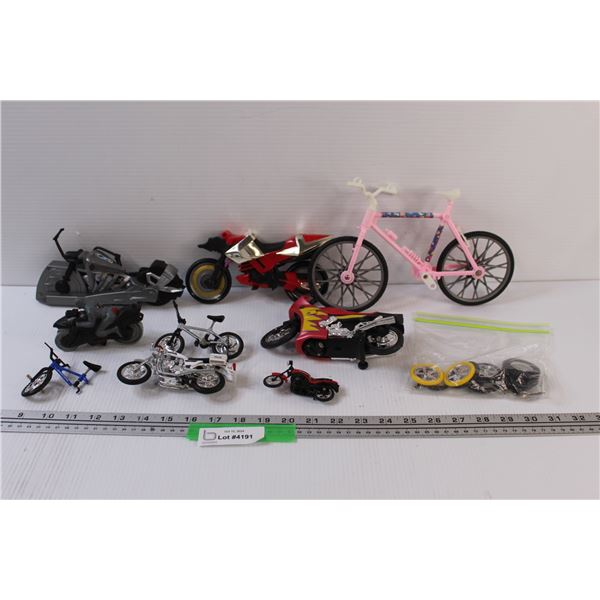 (9) Toy Bicycles & Spare Tires - as is