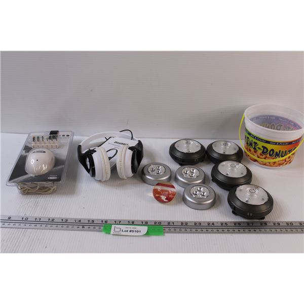 Lot: Sylvania Bluetooth Headphones (as is), (70 Puck Lights, as is, Power Centre - in box, as is