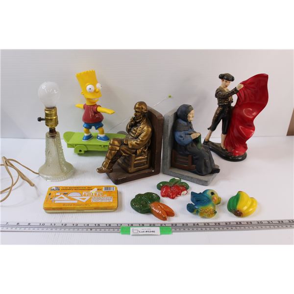 Lot: Bookends, Clear Antique Lamp - Works, Bart Simpson Skateboard (Missing Wheel), Matador Figurine