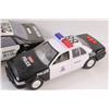 Image 4 : Lot: (2) Police Toy Cars, Steve Austin Figurine, Bust of a Man, Firearm Safety Dan Figurine