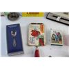 Image 3 : Canucks Money Clip, Silver Spoon, Playing Cards, Brass Bell, Multi Tool and Assorted Items