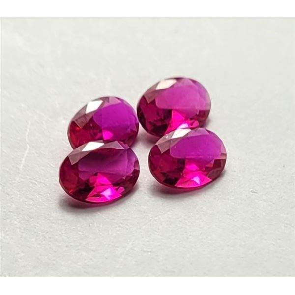 19)  LOT OF 4 NATURAL OVAL RUBIES, 2 CT IN TOTAL,