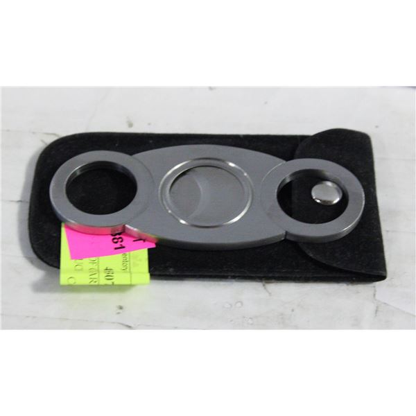 NEW PAIR OF CIGAR CUTTERS WITH VELVET POUCH