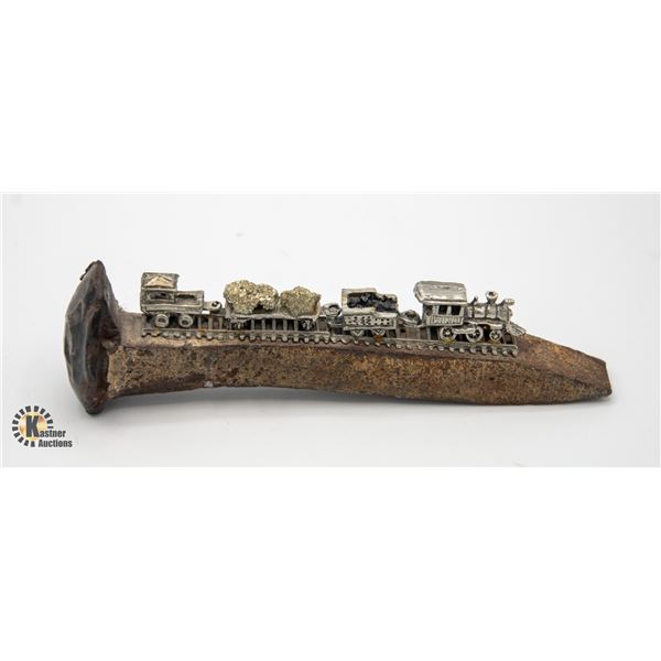 CUSTOM MADE DISPLAY ON ANTIQUE RAILROAD SPIKE