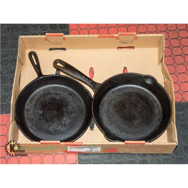 FLAT WITH TWO 10"-CAST IRON PANS INCL.