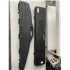 Image 1 : 2 HARDSIDE GUN CASES DOSKOSPORT AND GUN GUARD