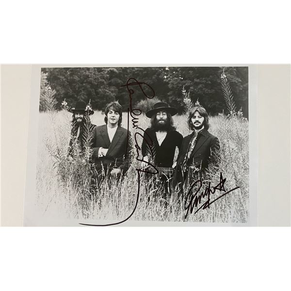 The Beatles rare band photo. GFA Authenticated