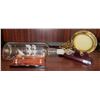 Image 1 : Hand Blown Pirate Ship in a Bottle w/ Brass Boat Frame