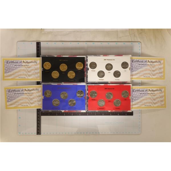 4 SETS OF 2007 US QUARTERS IN BOXES WITH PAPERS