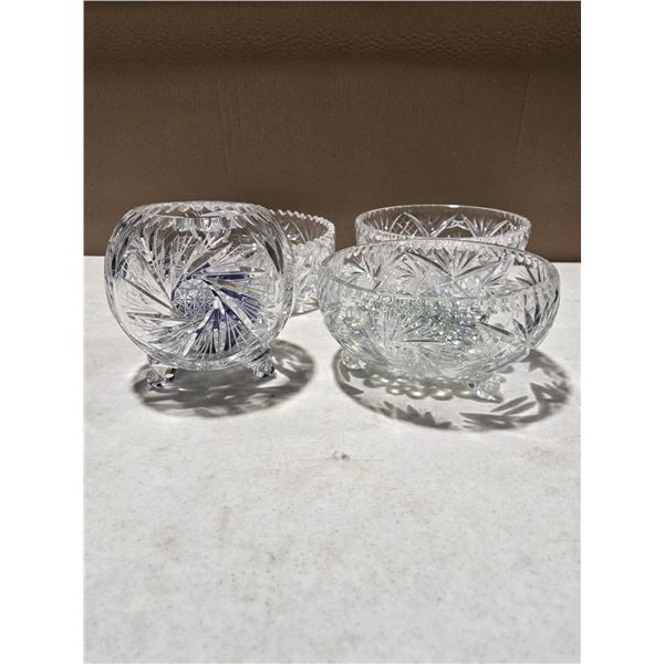 Four pinwheel crystal bowls