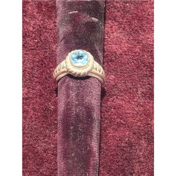 Sterling silver ring with blue topaz stone