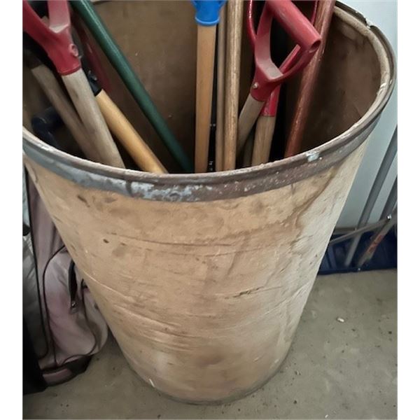 Large container with many shovel/broom handles - both used and new; plastic and wood