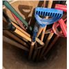 Image 3 : Large container with many shovel/broom handles - both used and new; plastic and wood