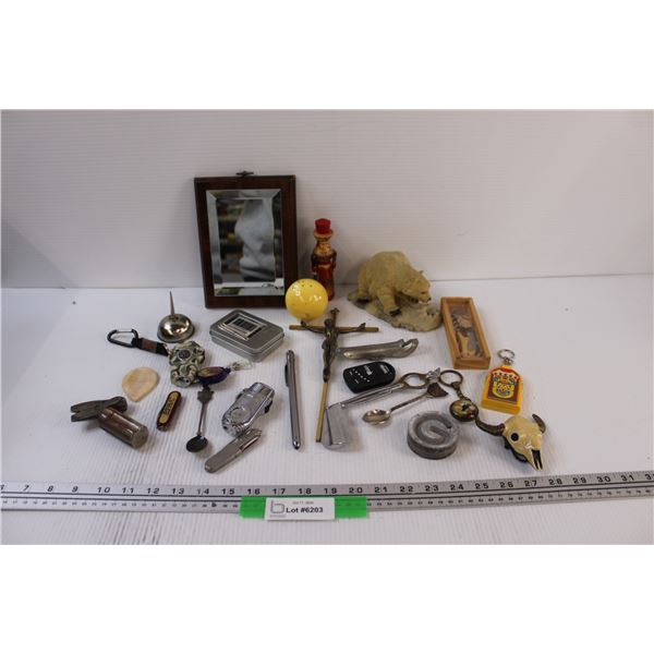 Lot: Bull Skull Belt Buckle, Crucifixion Cros, Mirror, Oil Can, Lighters, Polar Bear Figurine, Misc.