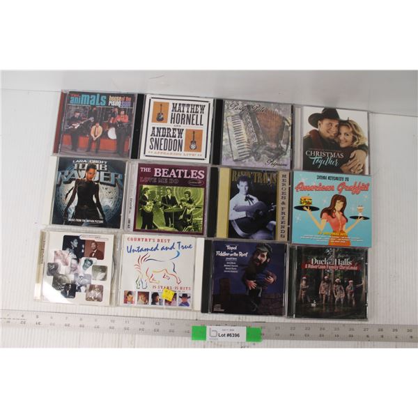 (12) CD's - Duck Halls, Tomb Raider Music, The Animals, etc.