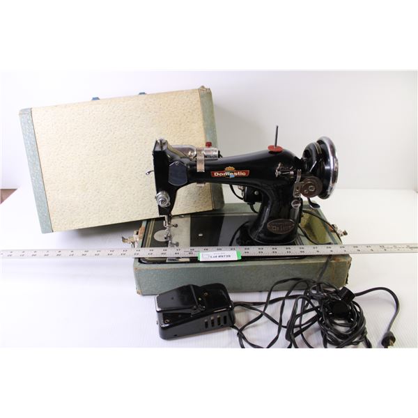 Domestic Sewing Machine in Case (powers on - light works)